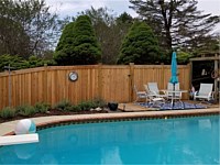 <b>6 foot high Cedar Board and Batten Privacy Fence with Cedar Fascia on top - New England Post Caps</b>